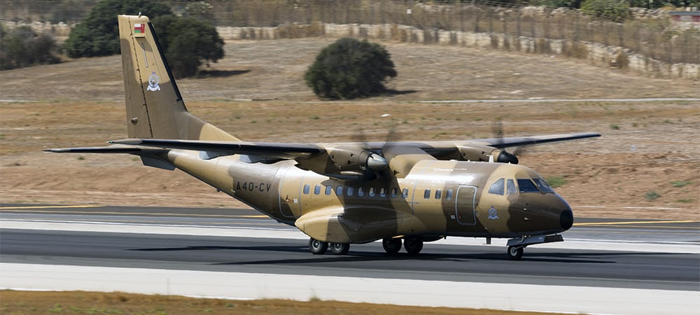 Military plane on desert tarmac